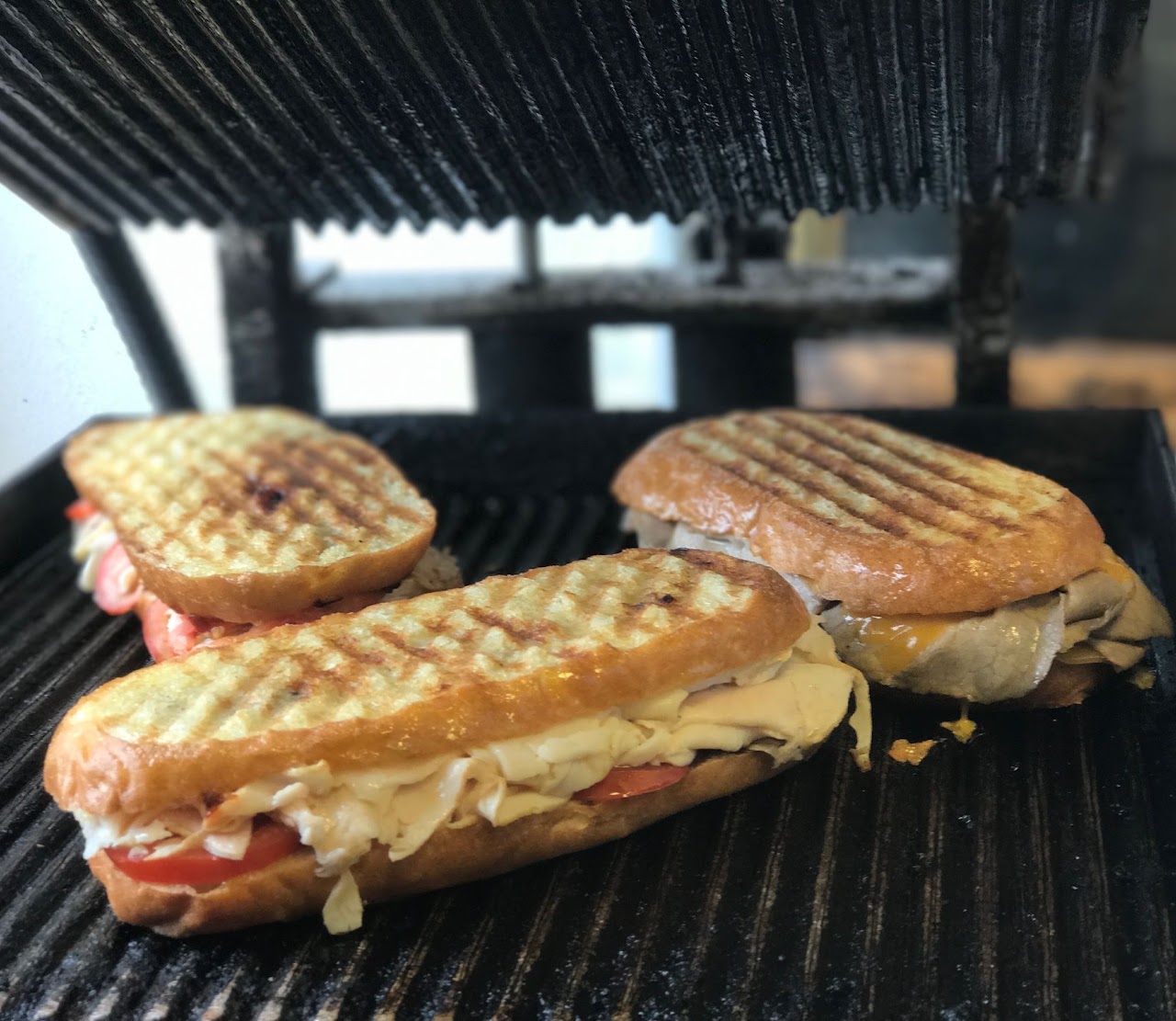 Paninis pressing on the grill at Modigliani Cafe